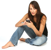 image of sitting girl using pda