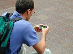image of man using pager